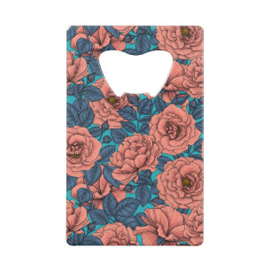 Roses roses avec feuilles bleus sur bleu