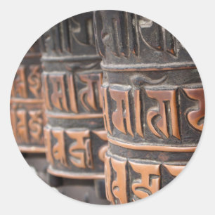 Roues de prière bouddhiste autocollant rond