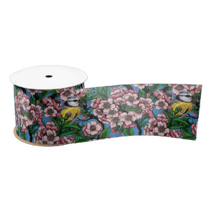 Ruban En Satin Rameaux bleus dans le cerisier en fleurs sur le bl