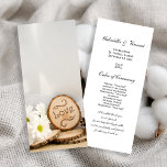 Rustic White Daisies Woodland Wedding Programme<br><div class="desc">Annoncez l'ordre de votre cérémonie de mariage boisé avec le Rustic White Daisies Woodland Wedding Program. Cette chronologie décontractée mais élégante de bois d'extérieur ou de mariage de forêt présente une photographie de nature surannée d'un bouquet de fleurs marguerites blanches, tranche de bois avec le mot LOVE brûlé dessus, cônes...</div>