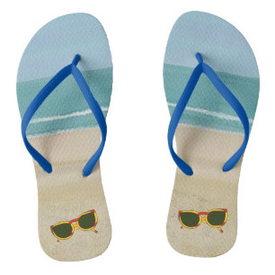 Sable de plage océan ciel lunettes de soleil tongs