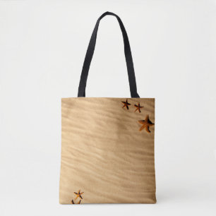 Sable et étoiles sur un sac fourre-tout