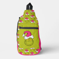 Le Grinch avec un chapeau de Père Noël rose
