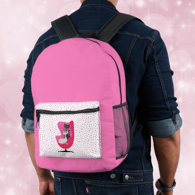 Sac À Dos Imprimé Chats atomiques en Chaise rose brillant rose avec  (Hot pink back pack with pink dots and two atomic cats in a pink chair on the front pocket.)