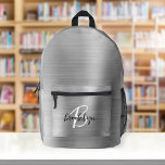 Sac À Dos Imprimé Métal brossé argenté Noir Blanc Script Monogramme<br><div class="desc">Ce sac à dos personnalisé est doté d'un monogramme et d'un prénom en écriture moderne en noir et blanc sur un élégant arrière - plan en métal brossé faux argent.</div>