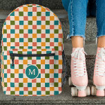 Sac À Dos Imprimé Monogramme de tableau de contrôle rétro mignon Mul<br><div class="desc">Ce sac à dos personnalisé amusant et élégant dispose d'un motif en damier dans les tons rétro jaune doré, turquoise, vert olive, orange melon et crème. Un modèle de texte initial monogramme est inclus - utilisez-le pour personnaliser votre sac à dos ou le retirer et le cercle, si vous ne...</div>