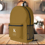 Sac À Dos Imprimé Monogramme Luxe minimal Élégant Or<br><div class="desc">Un design vertical minimaliste dans un style élégant avec une couleur dorée et un gros monogramme initial typographique. Le texte peut facilement être customisé pour un design aussi unique que vous êtes !</div>