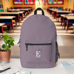 Sac À Dos Imprimé Typographie Monogramme Moderne Et Élégante Violet<br><div class="desc">Un design de sac à dos audacieux et magnifique avec une disposition élégante de votre nom et monogramme avec sérifs classiques et une typographie de script plus ornée dans une symétrie équilibrée. Les trois éléments se fondent dans une harmonie sophistiquée et créent votre propre logo de marque personnelle. Montré ici...</div>