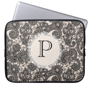 Sac à main élégant en dentelle noire avec monogram