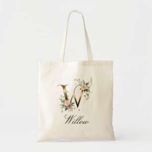 Sac à main élégant en or avec monogramme floral le