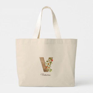 Sac à main en bois avec lettre V et monogramme flo