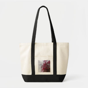 Sac à main vibrant rouge de photographie de fleurs