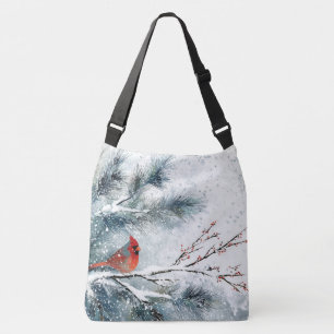 Sac Ajustable Cardinal rouge sur branche de pin enneigée