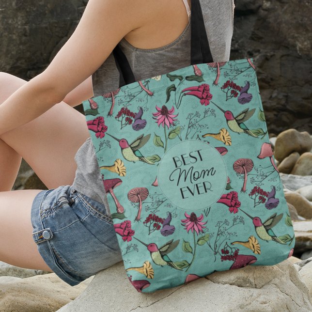 Sac Ajustable Meilleure Maman Jamais Turquoise Colibri Floral (FRONT: Best Mom Ever Hand-Drawn Hummingbird, Flowers & Mushrooms
BACK: Photo & 2 Personalized Texts.)