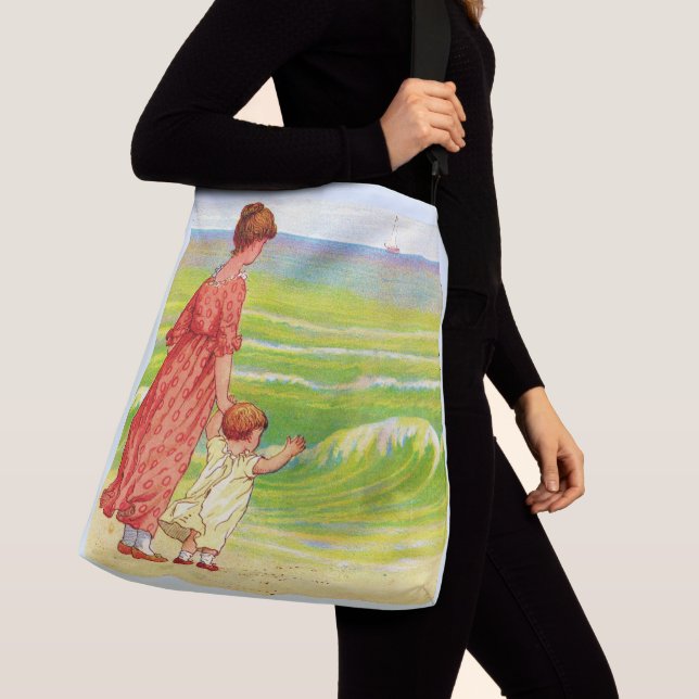 Sac Ajustable mère et bébé sur la plage (De près)
