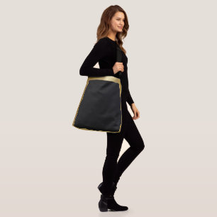 Sac Ajustable Noir avec une bordure dorée, simplicité élégante