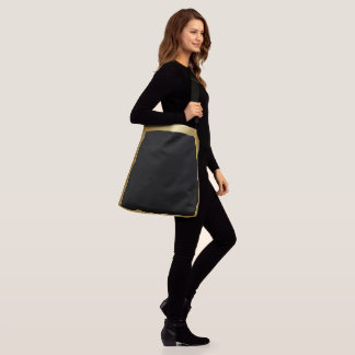 Sac Ajustable Noir avec une bordure dorée, simplicité élégante