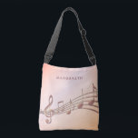Sac Ajustable Rose or note musique nom du musicien<br><div class="desc">Simple et élégant pour un mélomane ou un musicien ! arrière - plan rose dégradé or avec notes de musique rose or. Modèle pour votre nom,  écriture manuscrite de style.</div>
