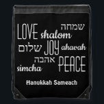 Sac Avec Cordons Hanoukka hébreu noir<br><div class="desc">Sac à corde HANOUKKA élégant avec LOVE JOY PEACE incluant des traductions en hébreu en typographie noire contre un RICH arrière - plan NOIR. Le texte est PERSONNALISABLE, en coque vous souhaitez changer quoi que ce soit. HAPPY HANOUKKA est également personnalisable, vous pouvez donc remplacer par un nom ou des...</div>