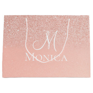 Sac cadeau à monogramme rose bébé pailleté pour do