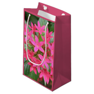 Sac cadeau aux fleurs tropicales rose vif