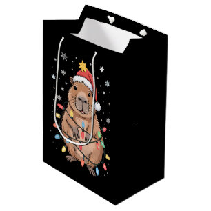 Sac Cadeau Moyen Capybara de Noël avec chapeau de Père Noël lumière