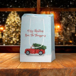 Sac Cadeau Moyen Christmas Vintage Red Truck Winter Snowflakes Cute<br><div class="desc">Rustic Vintage Red Truck with a Fresh Christmas Tree in the truck bed. A cute winter scene depicting a familiar family tradition. A personalized template for Holiday and Christmas gift-giving. This design features a Christmas vintage red truck simple, a cute traditional classic winter scene, whimsical typography template, simple minimalist to...</div>