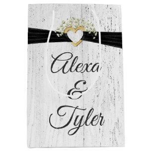 Sac Cadeau Moyen Coeur avec ruban noir sur bois blanchi