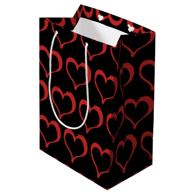 Sac Cadeau Moyen Coeurs rouges sur le motif noir d'amour (Dos Angle)