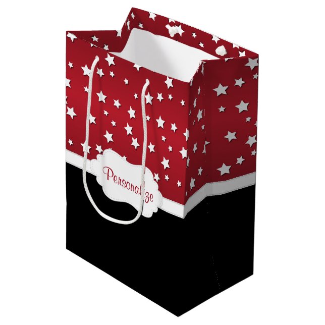 Sac Cadeau Moyen Étoiles sur un fond rouge chic (Devant Angle)