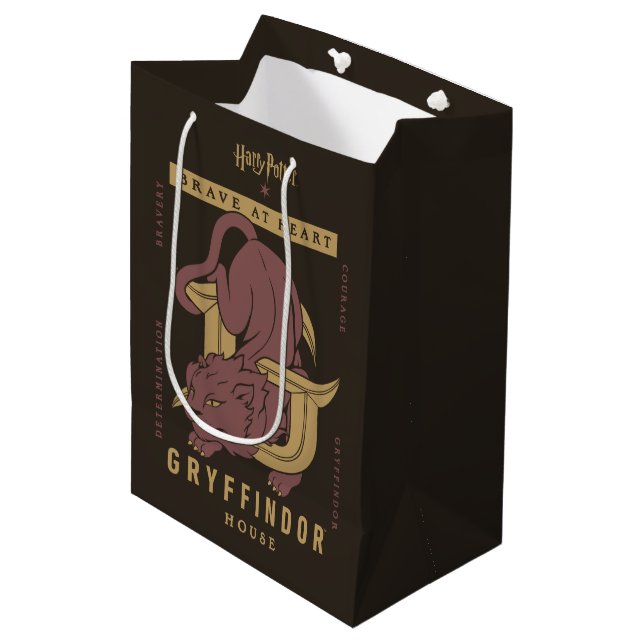 Sac Cadeau Moyen GRYFFINDOR™ Maison Brave au coeur (Devant Angle)
