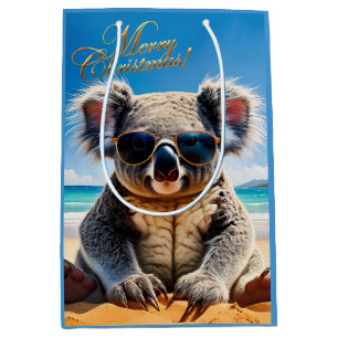 Sac Cadeau Moyen Koala sur une plage de sable Joyeux Noël