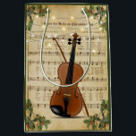 Sac Cadeau Moyen Vintage Christmas Sheet Musique et violon<br><div class="desc">Ce magnifique sac cadeau de Noël de ballet est doté d'un design de partitions de Noël vintage avec des lampes à cordes et un violon.</div>