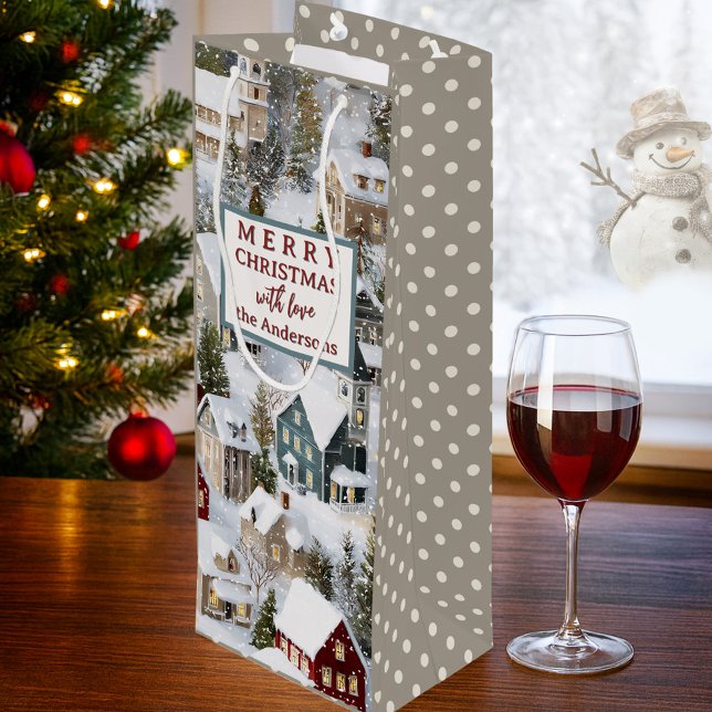Sac Cadeau Pour Bouteille Noël d'hiver traditionnel  (Christmas gift bag featuring a snow covered city with pine trees on a classic polka dot pattern)