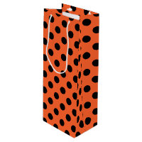 Pois noirs sur orange