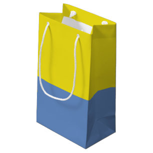 Sac de cadeau de jaune et de bleu de ciel