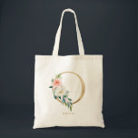 Sac de demoiselle d'honneur à monogramme lettre O<br><div class="desc">Le sac fourre-tout à monogramme lettre O florale présente un bouquet de fleurs aquarelles de pivoines et de roses blanches et roses saumon, un accent de verdure et une lettre en feuille d'or. Ce sac fourre-tout à monogramme de demoiselle d'honneur à lettre O florale est parfait pour les mariages, les...</div>