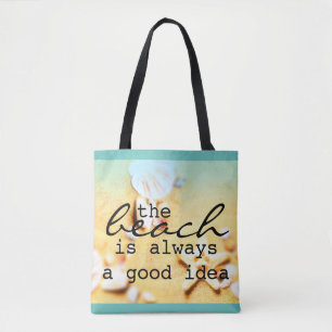 sac de plage coquilles de mer et sable avec texte