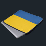 Sac d'ordinateur portable bleu et jaune<br><div class="desc">Portez votre ordinateur portable avec style dans ce coque bleu et jaune.</div>