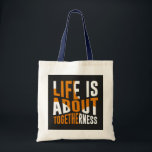 Sac fourre-tout d'unité - La vie est une question<br><div class="desc">Portez un message d'unité et de convivialité avec ce sac fourre-tout élégant. Doté d'un design audacieux et de l'expression "La vie est au sujet de l'unicité", ce sac est parfait pour tous ceux qui aiment la connexion et la communauté. Fabriqué à partir de matériaux de haute qualité, il est idéal...</div>