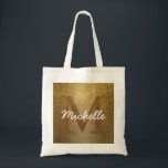 Sac fourre-tout Monogramme personnalisé, Parties s<br><div class="desc">Un riche arrière - plan d'or appliqué à la fausse parties scintillant d'or crée une atmosphère riche et presque antique pour ce sac fourre-tout. L'initiale de la femme est marron foncé pour fondre dans l'éclat doré. La parties scintillant d'or brille au-dessus. Le nom de la femme est au-dessus de celui-ci...</div>