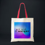 Sac fourre-tout unique - Célébrez l'individualité<br><div class="desc">Éloignez-vous de la foule avec ce sac fourre-tout accrocheur au design audacieux et coloré. Le message "vous êtes unique" est un rappel pour embrasser votre individualité et votre express vous-même avec confiance. Fabriqué avec des matériaux de haute qualité, ce sac est parfait pour l'usage quotidien, le shopping, ou comme cadeau...</div>