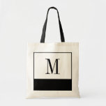 Sac noir et blanc élégant de monogramme<br><div class="desc">Si vous recherchez un sac de demoiselle d'honneur ou une idée personnalisée unique de cadeau de demoiselles d'honneur, ces petits sacs noirs et blancs élégants sont la réponse ! Le sac est disponible dans toutes les différentes tailles, et venu à un arrière-plan blanc avec un grand bloc noir de couleur...</div>