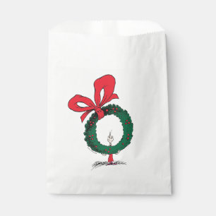 Sachets En Papier Qui regarde à travers la couronne de Noël