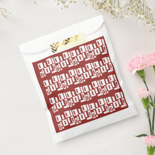 Sachets En Papier Un tapis rouge avec un motif texturé est étalé sur