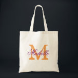 Sacs fourre-tout mariage violet orange<br><div class="desc">Sac fourre-tout mariage violet et orange avec monogramme personnalisé. Design vintage chic monogrammed. Personnaliser pour l'entourage des mariées ; demoiselles d'honneur, filles de fleurs, femme d'honneur, mère de la mariée, mère du marié, épouse d'équipe, invités, etc. Élégante typographie de script pour nom. Nom rustique initial. Aussi agréable pour les filles...</div>
