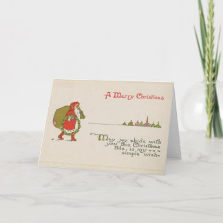 Santa Claus avec carte de Noël Wreath