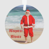 Santa Clause sur la plage les plus chauds souhaits