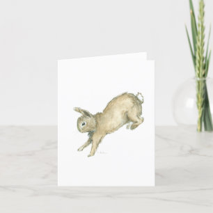 Sautant la carte vierge de note de lapin - blanc