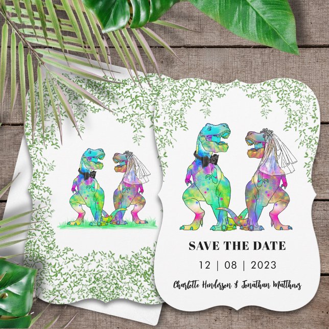 Save The Date Mariage sur le thème des dinosaures (Dinosaur wedding save the date invitation with colorful T-Rex bride & groom Jurassic jungle foliage )